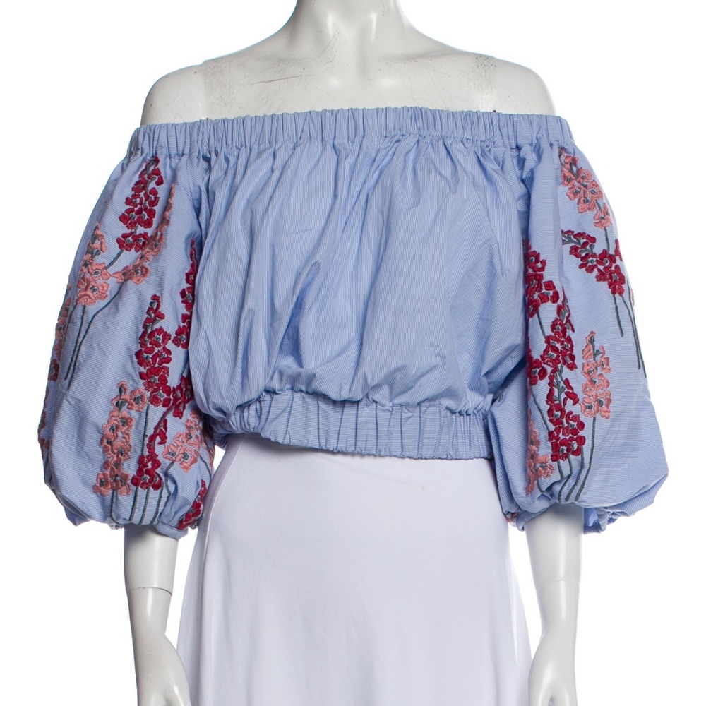 Silvia Tchersassi off the shoulder top.